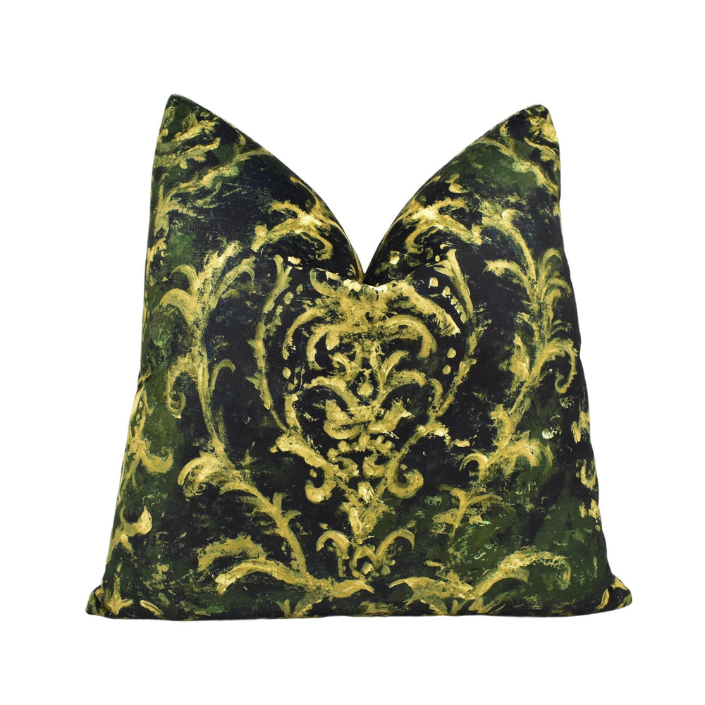 A decorative throw pillow with a black and gold floral pattern.