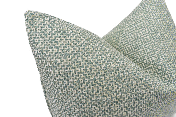 a close up of a pillow on a white background