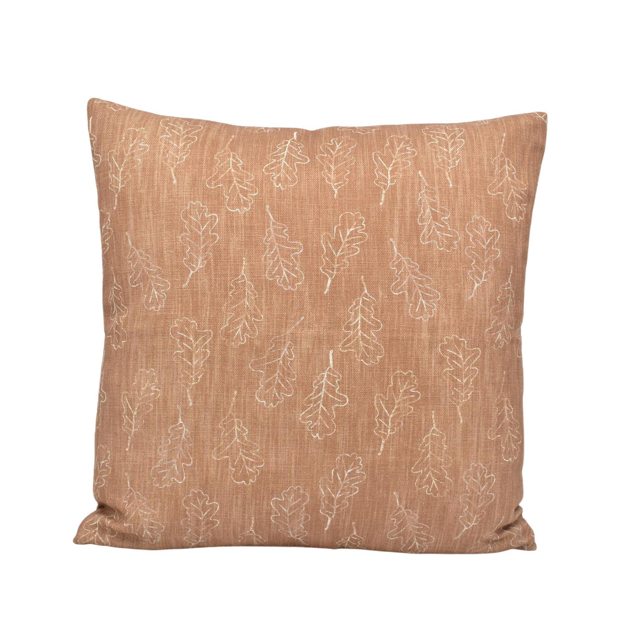 a brown pillow with white leaves on it