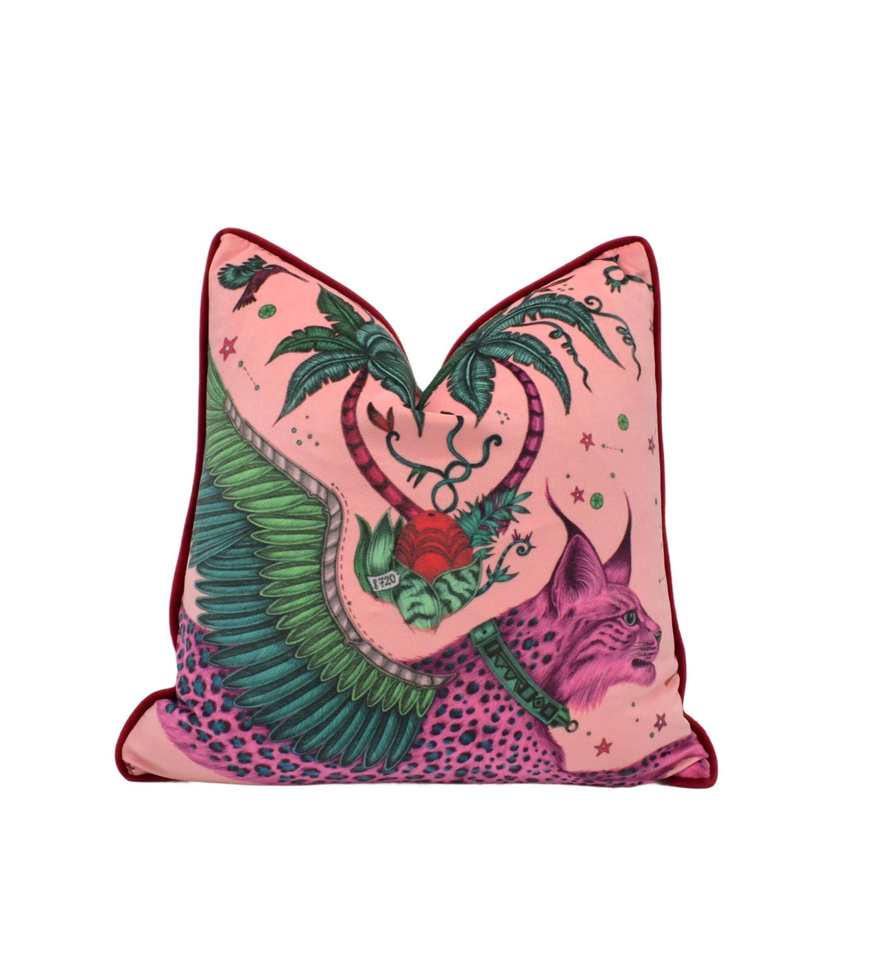 a pink and green pillow with an animal on it