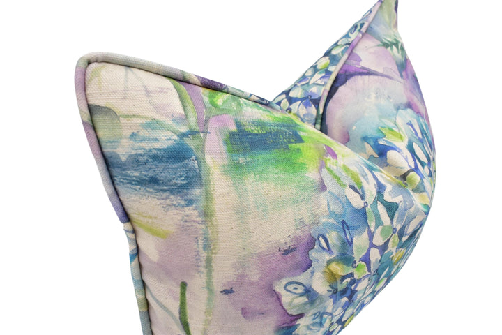 a close-up view of a colorful, abstract floral pattern on a fabric surface.