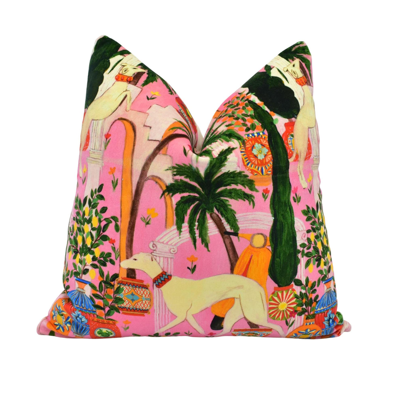 a pink pillow with a picture of a dog and palm trees