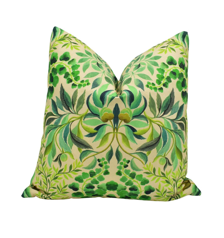 a large, green and leafy pillow with a repeating pattern of leaves and flowers.