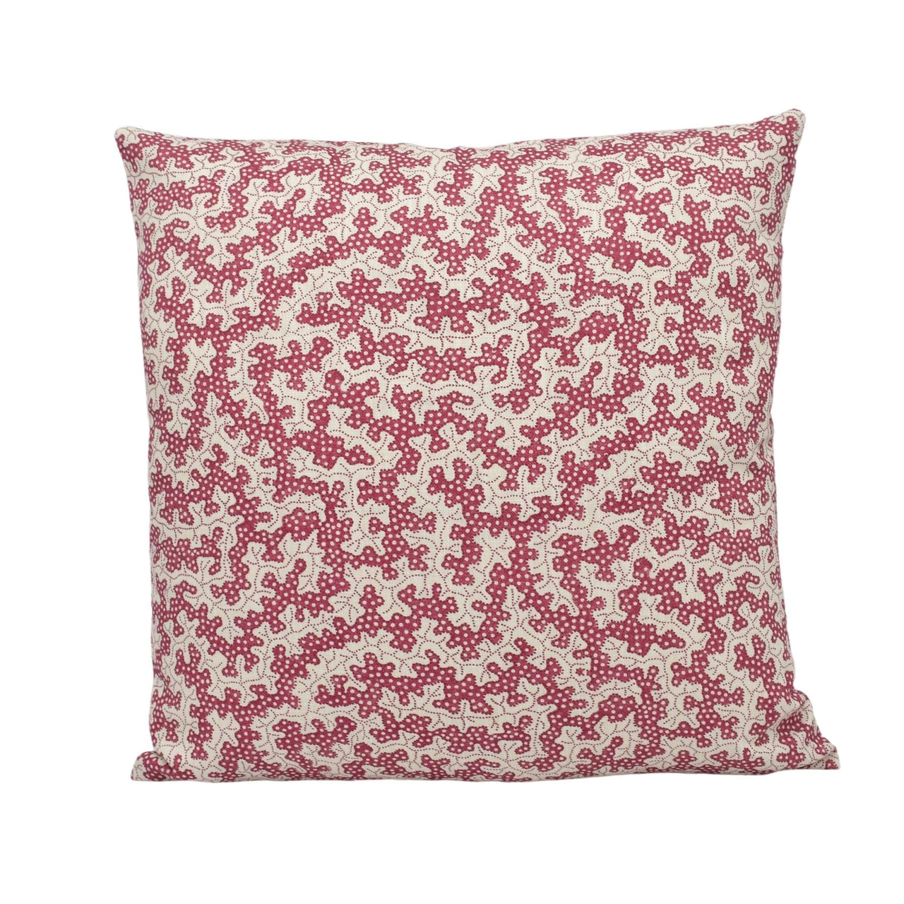 a red and white pillow on a white background