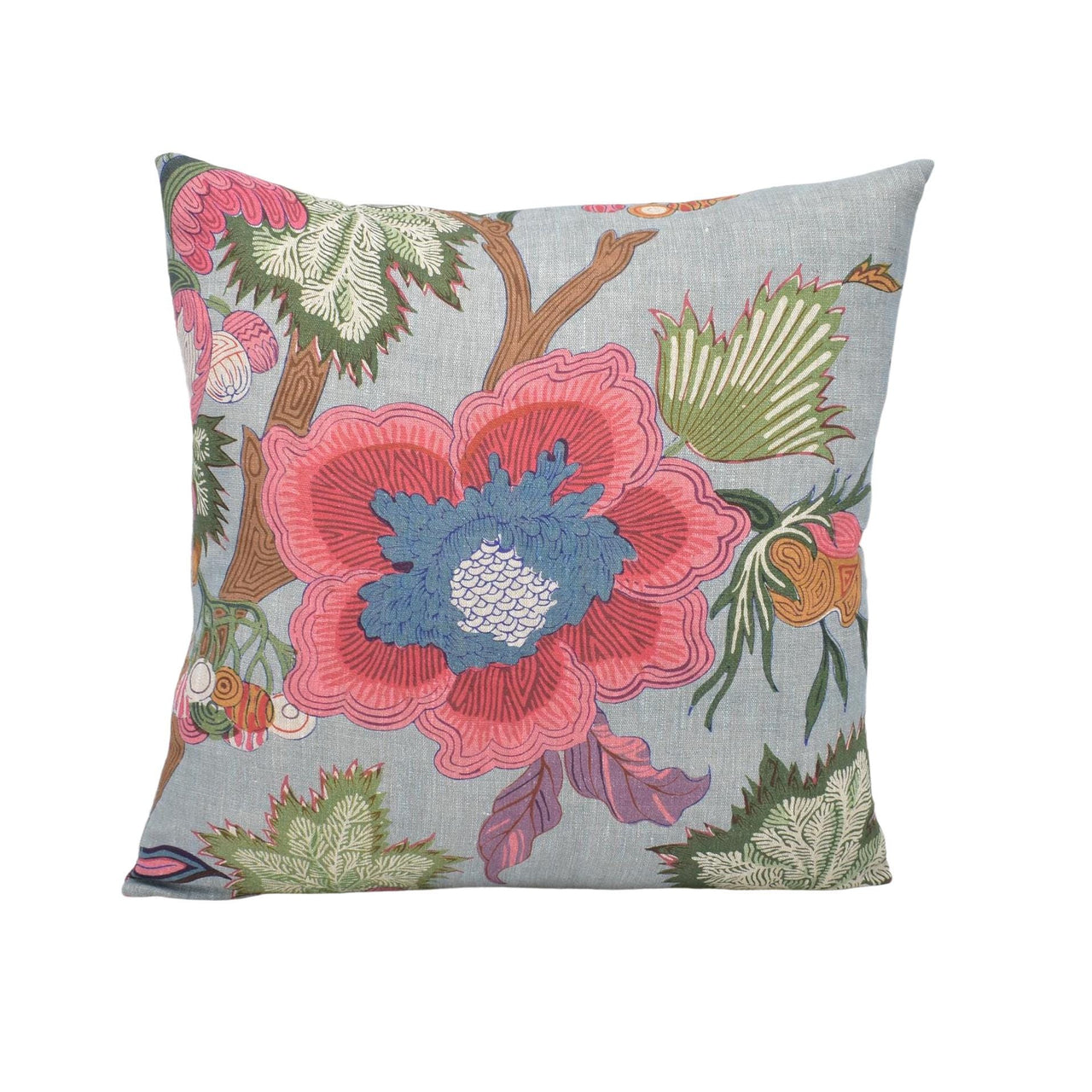 a blue pillow with a pink flower on it