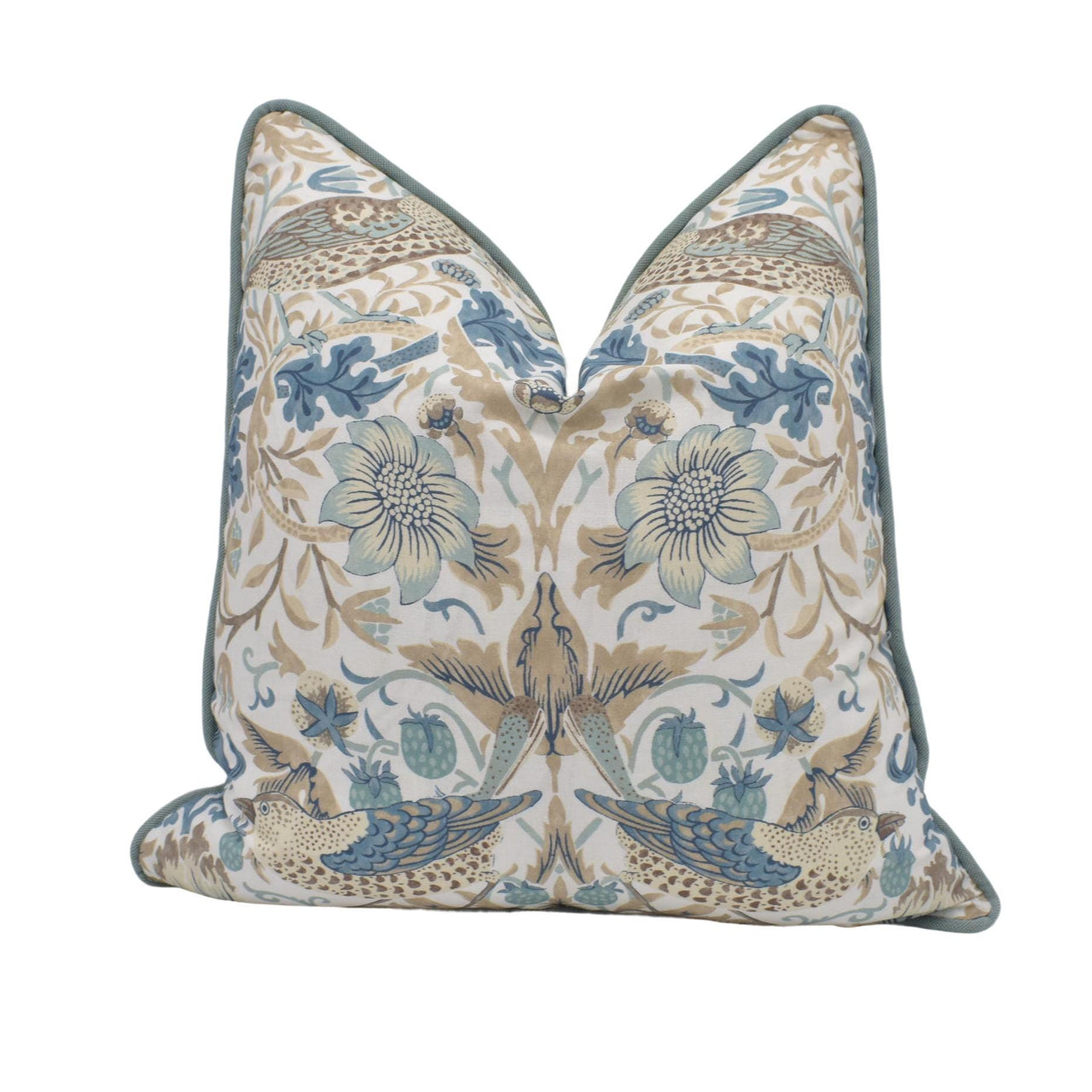 a blue and white pillow with two birds on it