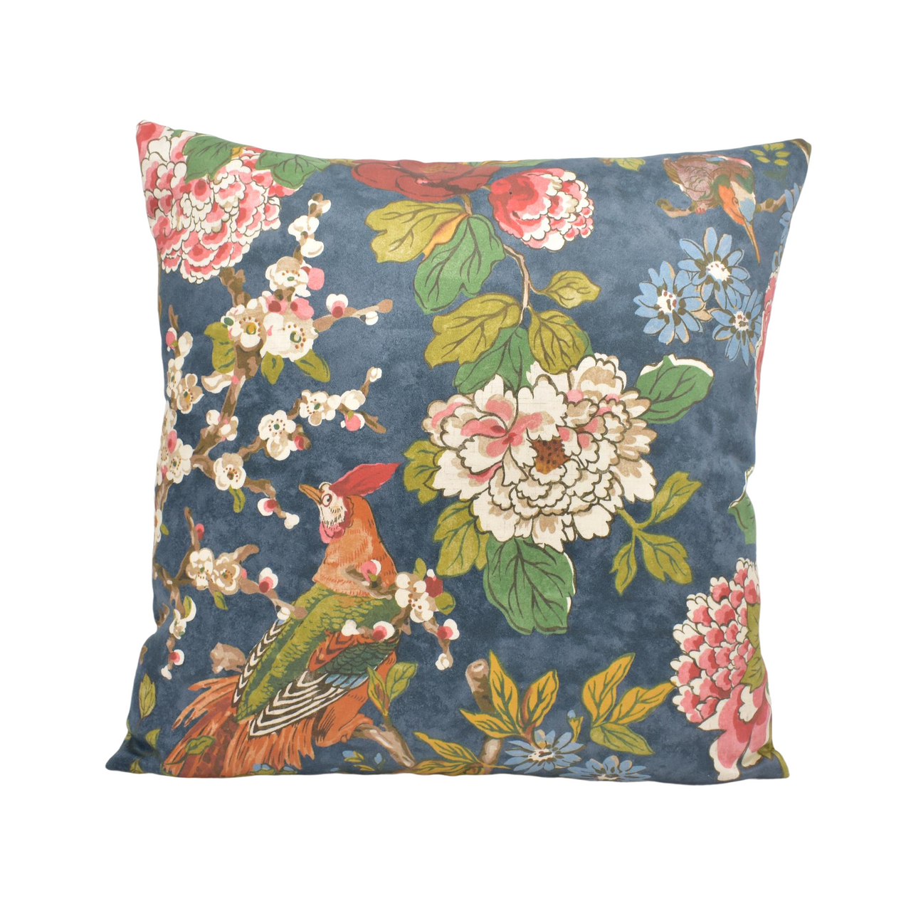 a blue pillow with flowers and birds on it