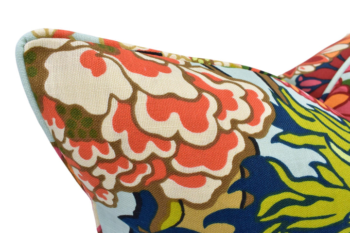 a close up of a colorful pillow on a white background