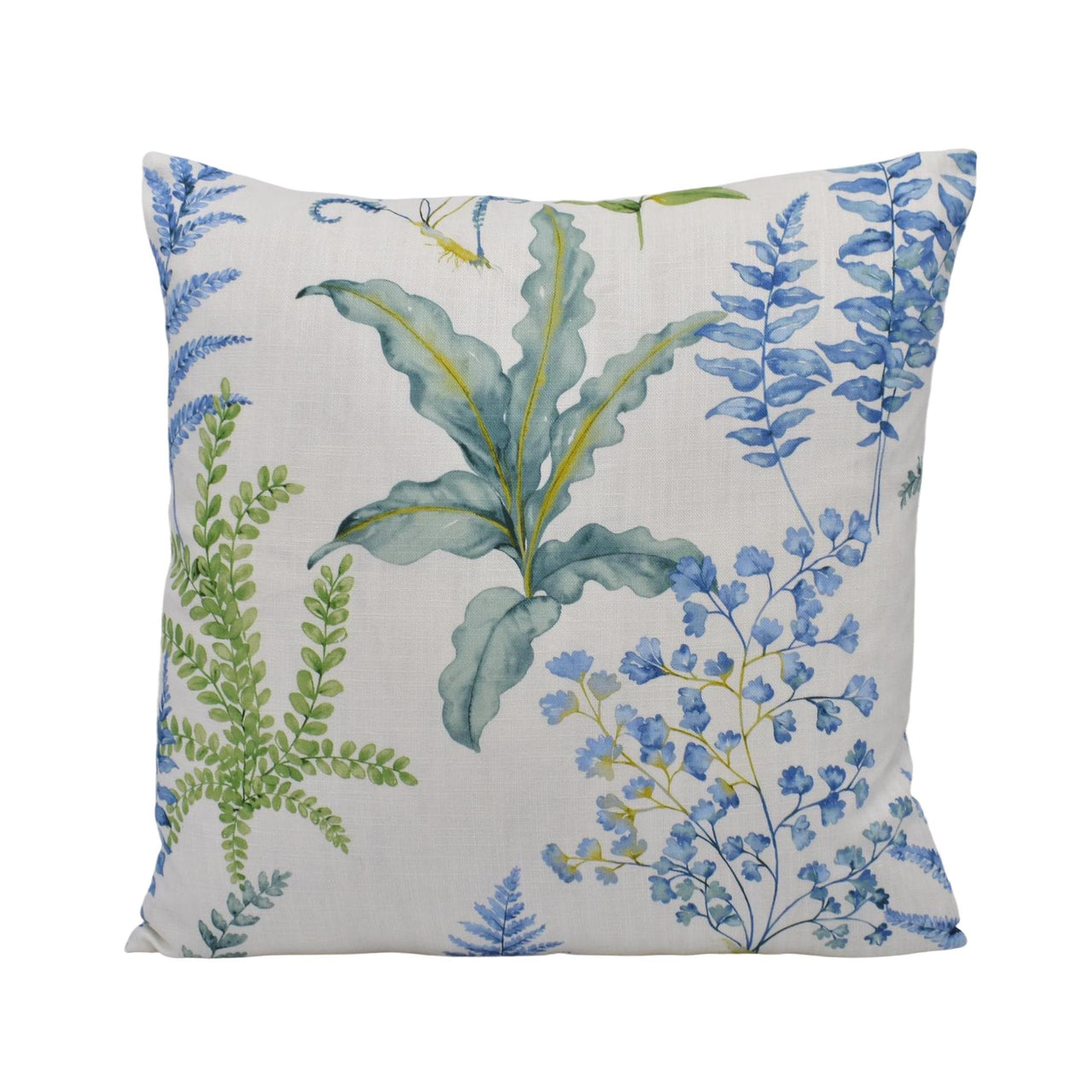 a white pillow with blue and green plants on it