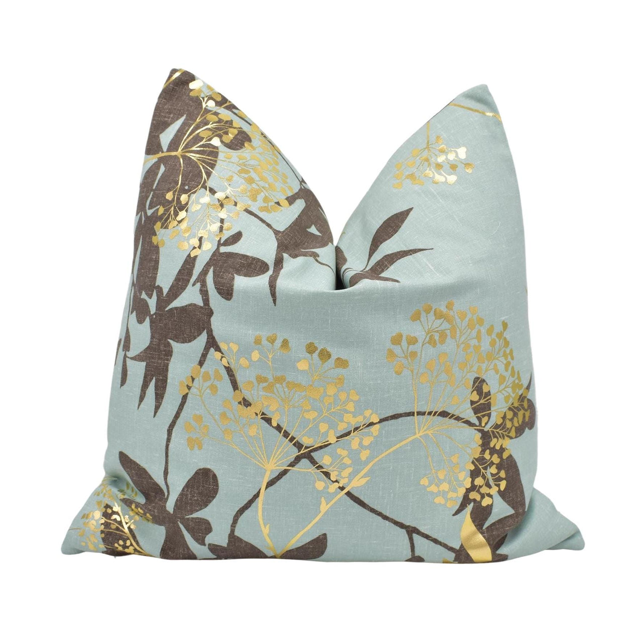 a blue pillow with a gold floral design