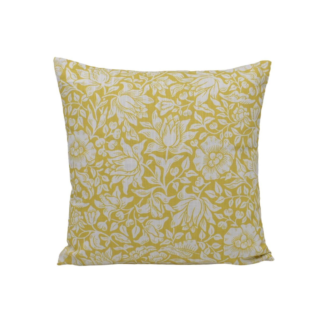 a yellow pillow with white flowers on it