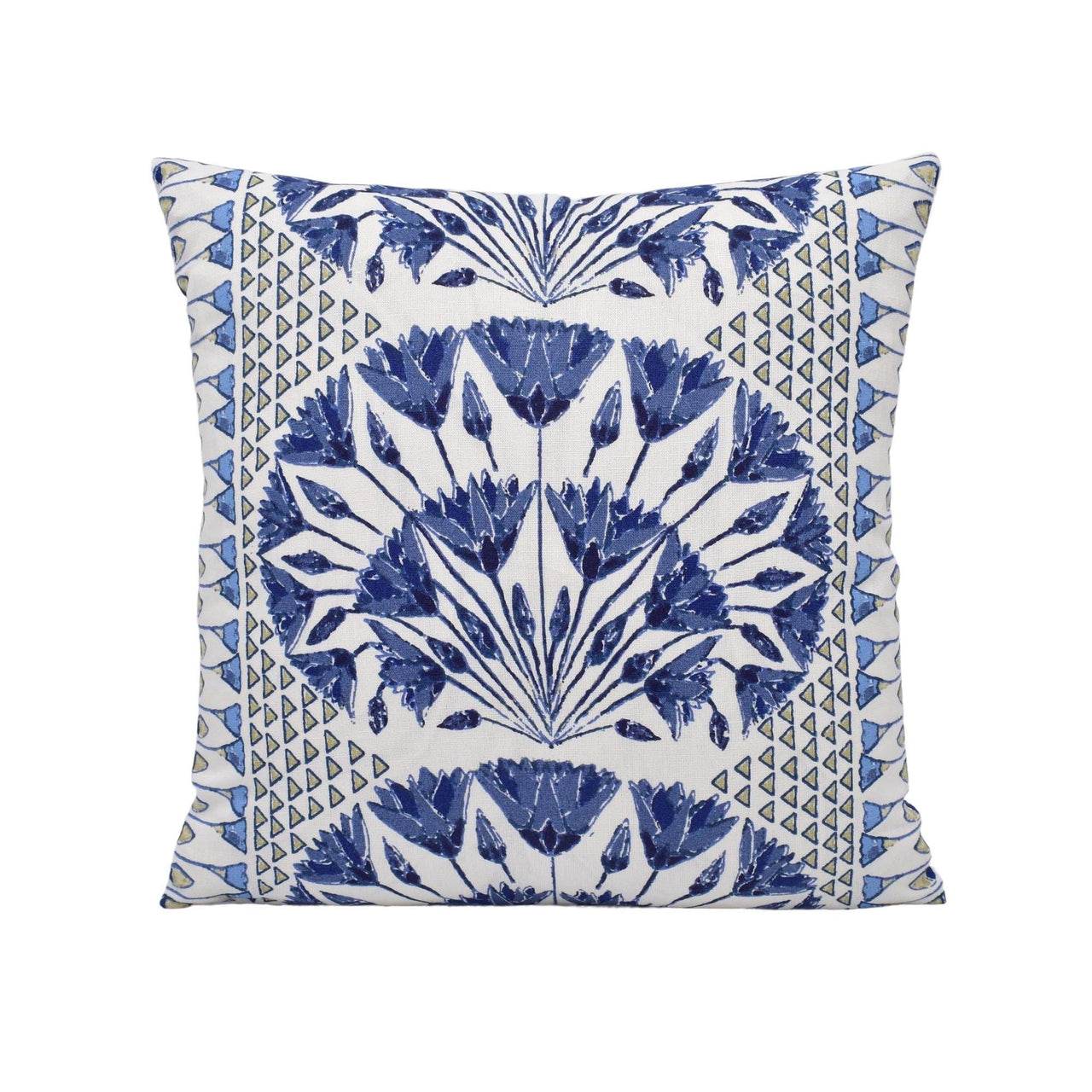 a blue and white pillow on a white background