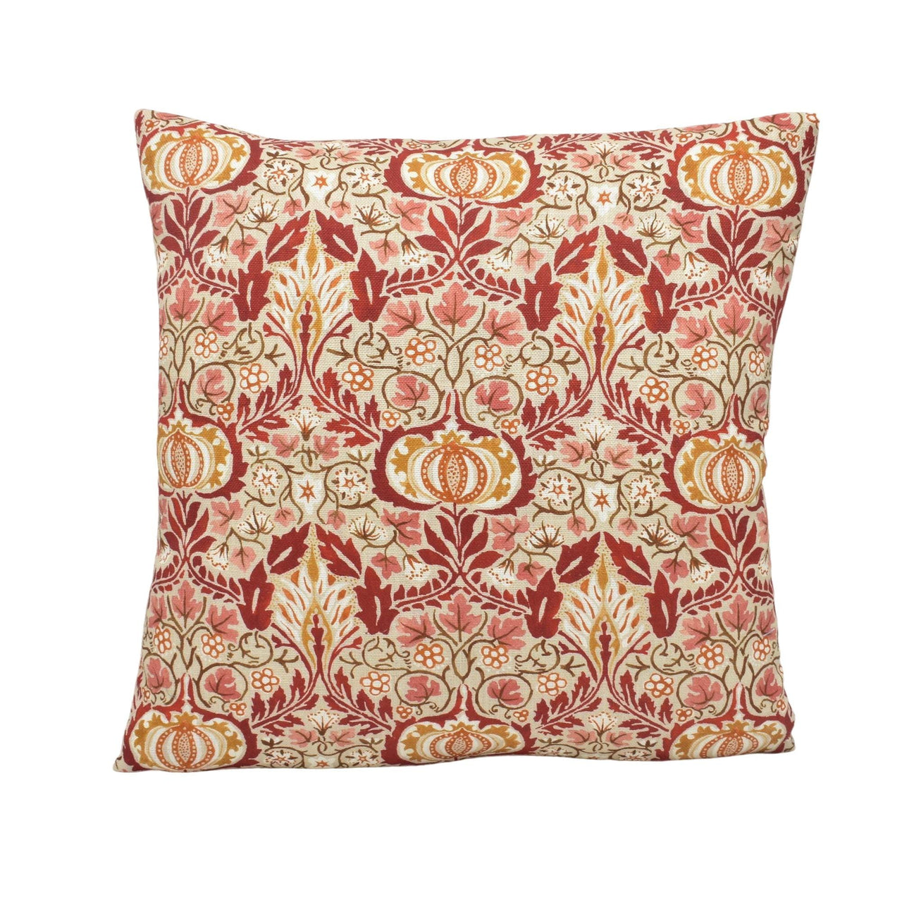 a red and yellow pillow with a floral pattern