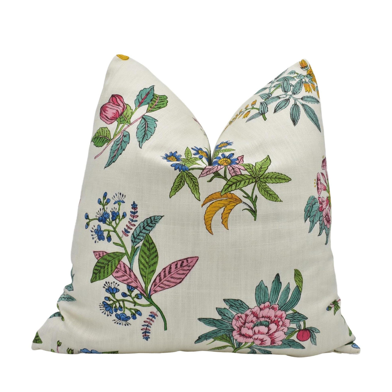 a white pillow with colorful flowers on it