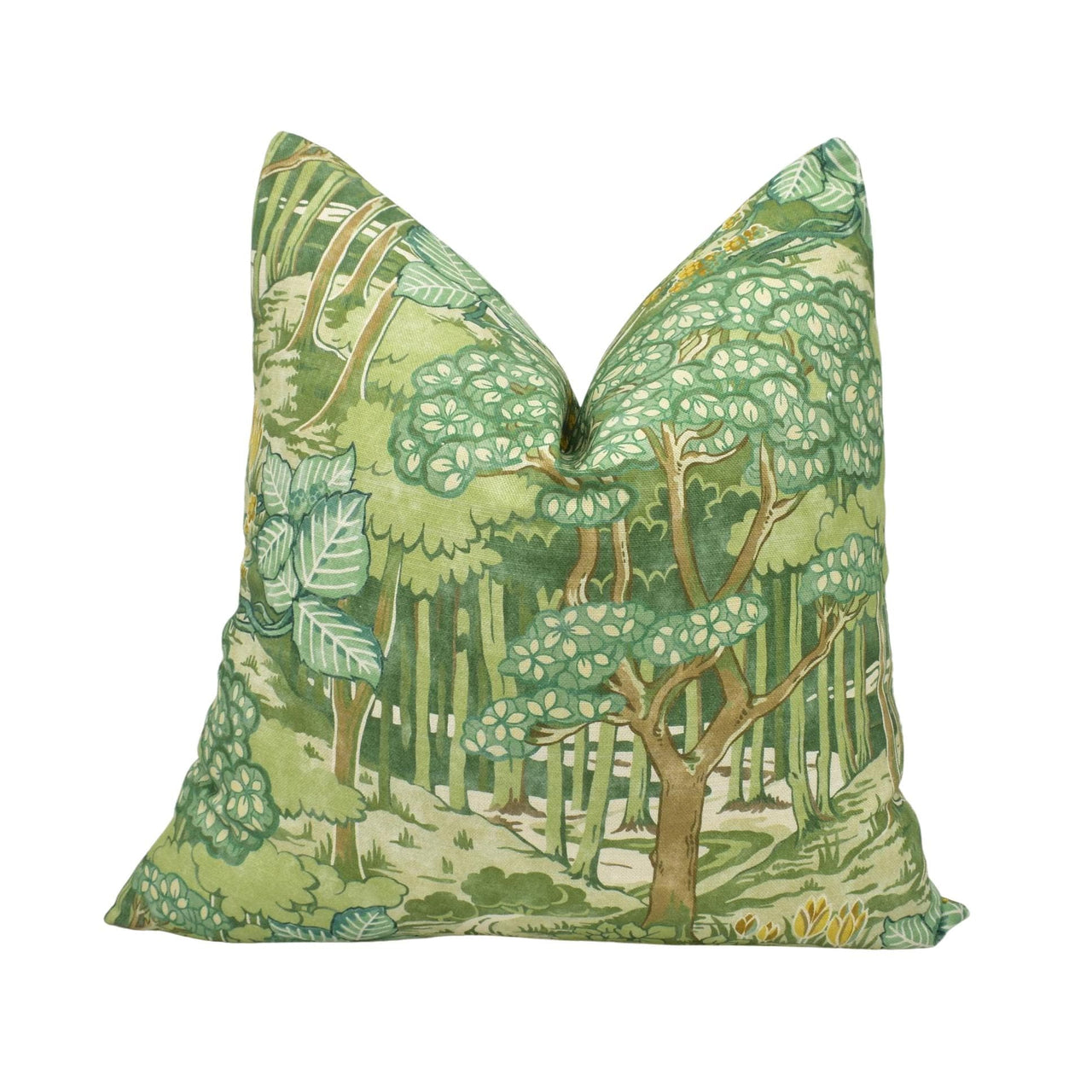 a green pillow with trees on it