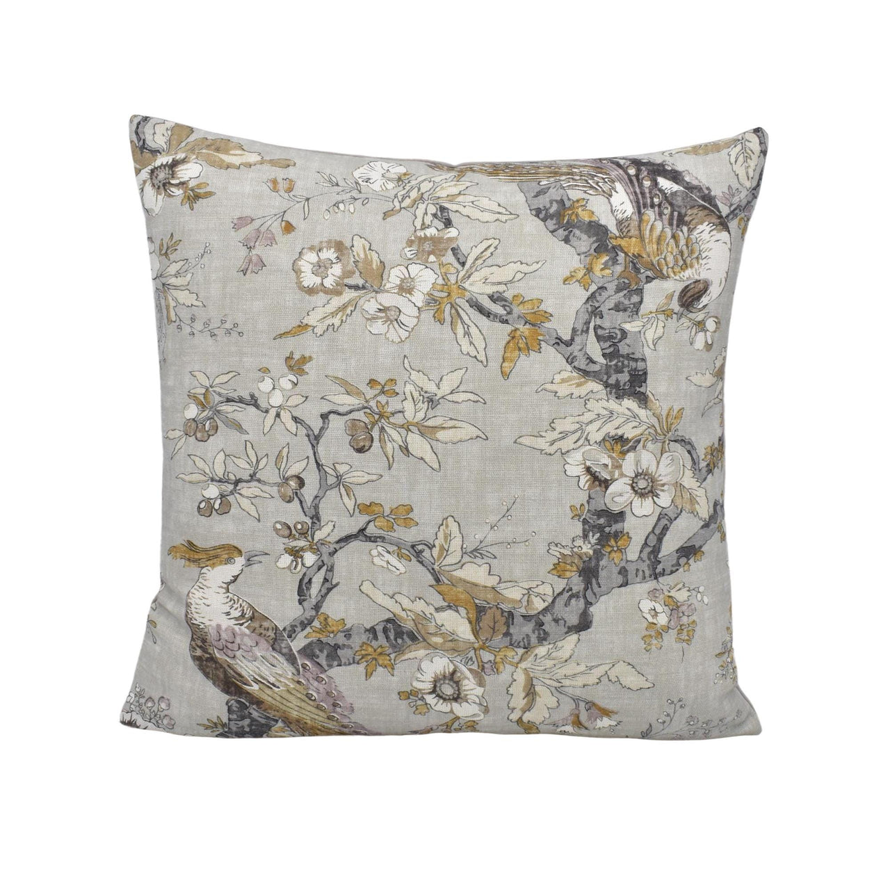 a pillow with a bird and flowers on it