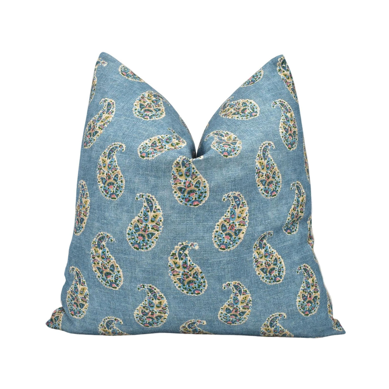 a blue pillow with a paisley pattern on it