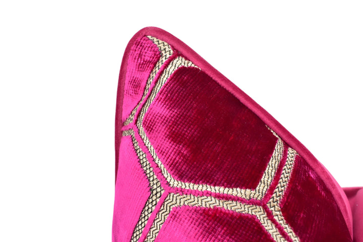 a close up of a pink tie on a white background