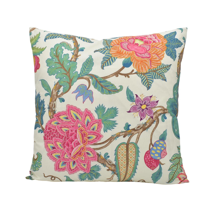 a white pillow with colorful flowers on it