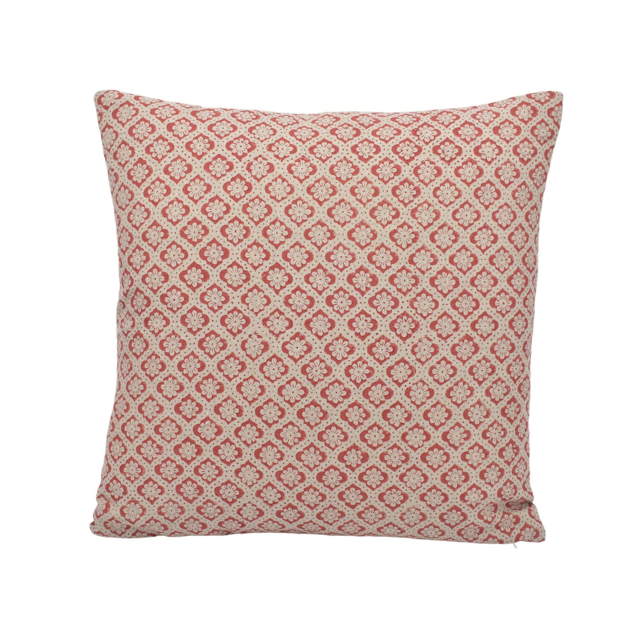 a red and white pillow on a white background