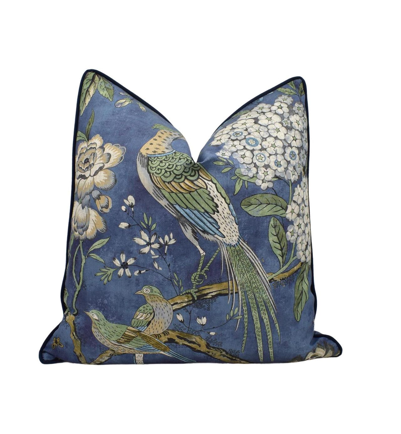 a blue pillow with a bird on it