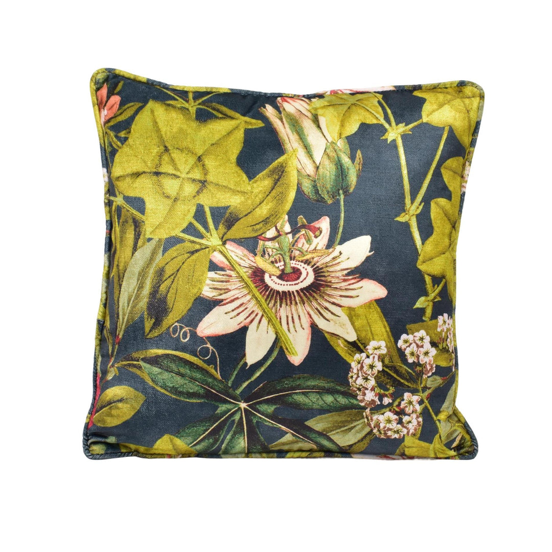 a blue and yellow pillow with a flower on it