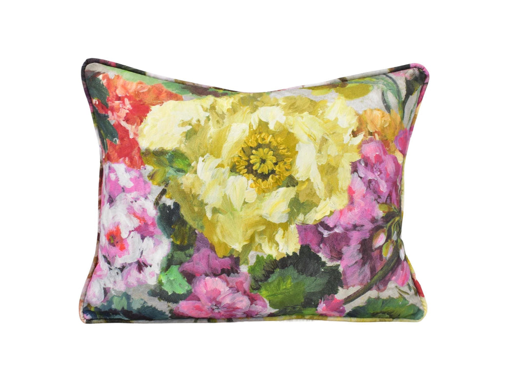 a pillow with a colorful flower print on it