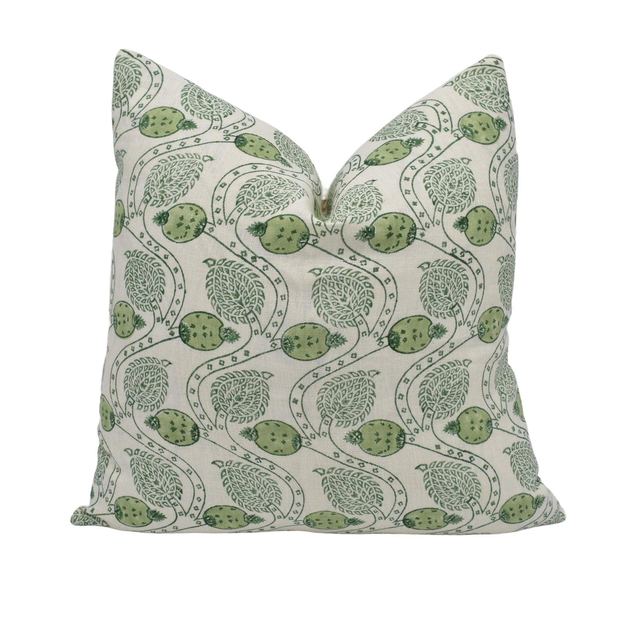 a green and white pillow on a white background