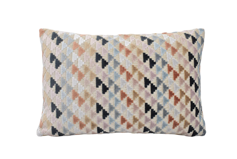 a multicolored pillow on a white background