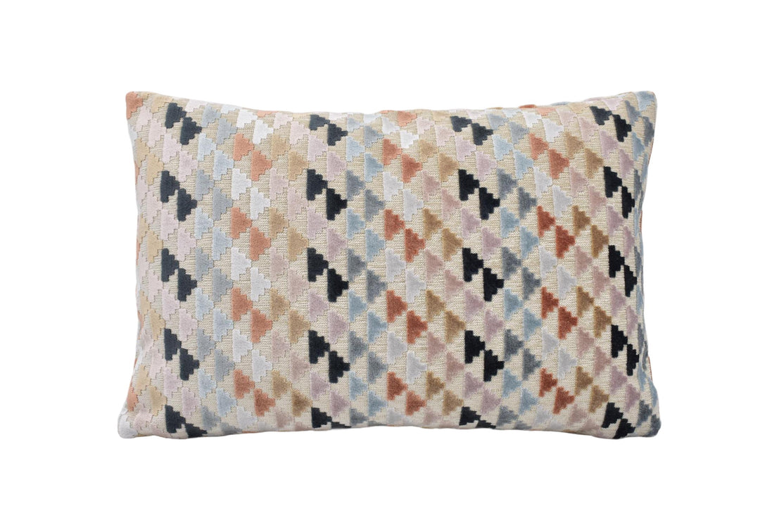 a multicolored pillow on a white background