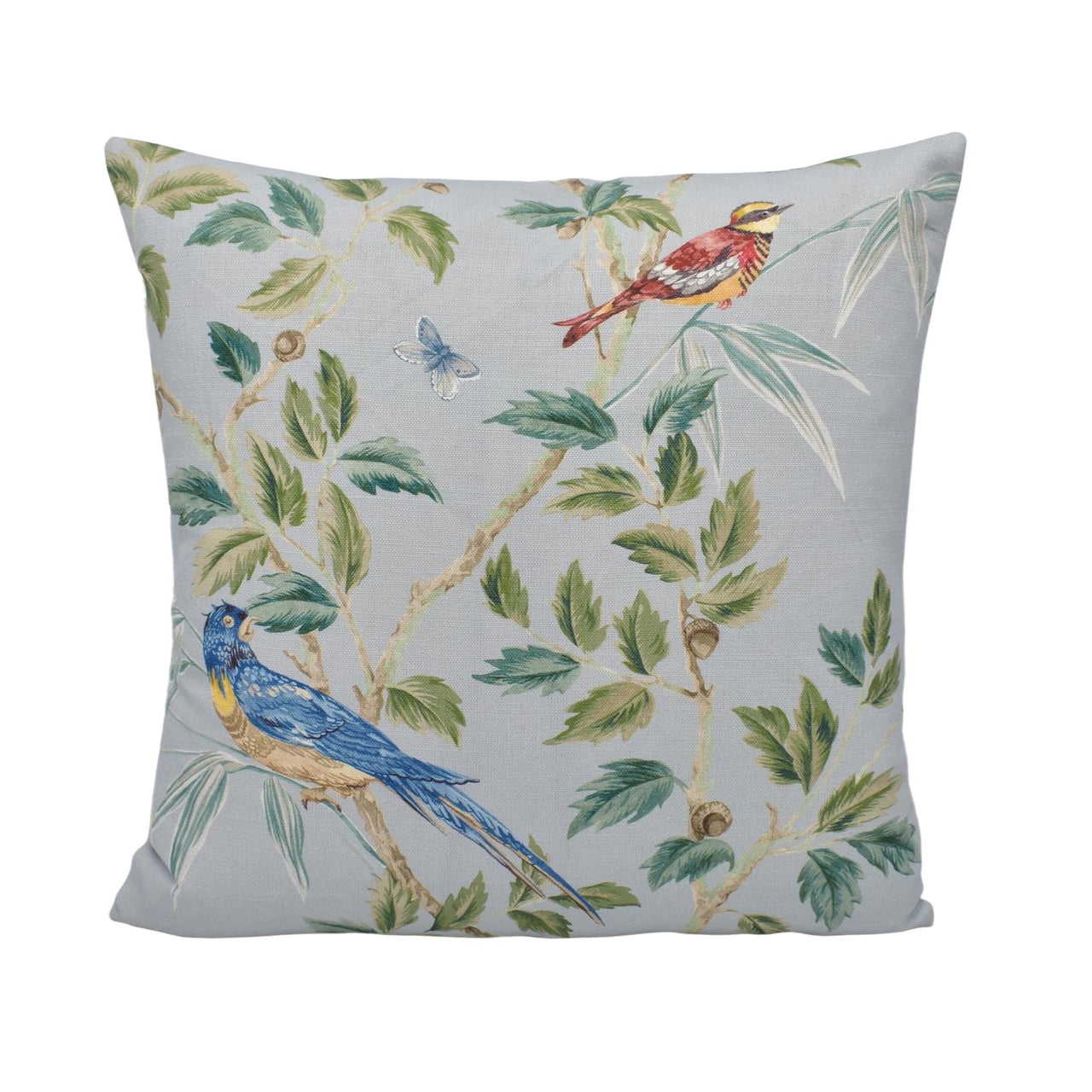 a blue and yellow pillow with birds on it