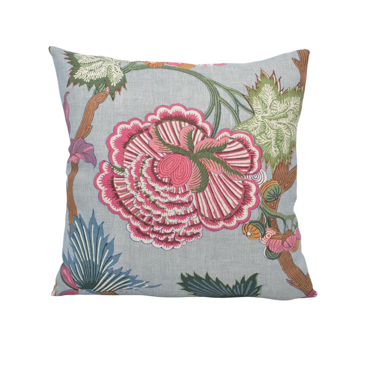 a blue pillow with a pink flower on it