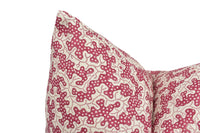 Thumbnail for a close up of a red and white pillow on a white background