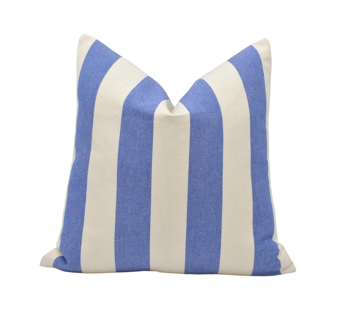 a blue and white striped pillow on a white background