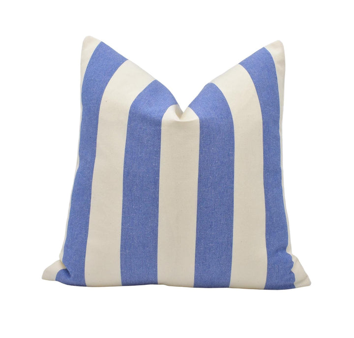 a blue and white striped pillow on a white background