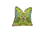 Thumbnail for a green pillow with pink flowers on it