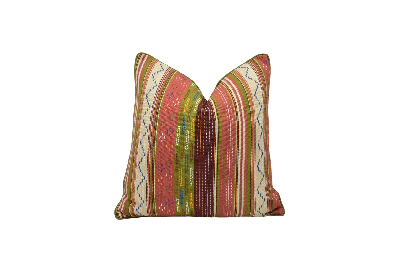 a pillow with a colorful stripe pattern on it