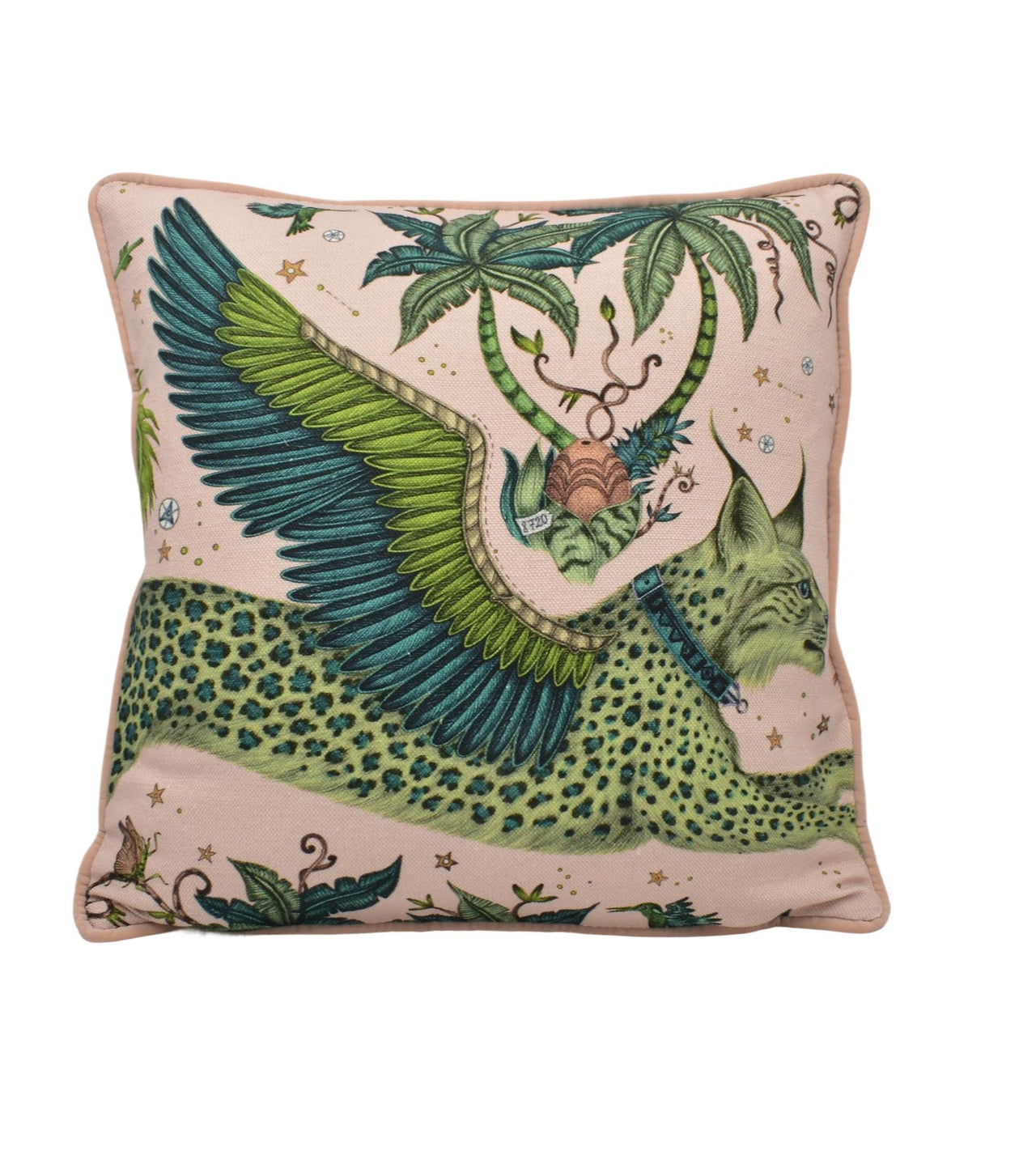 a green and white pillow with a bird on it