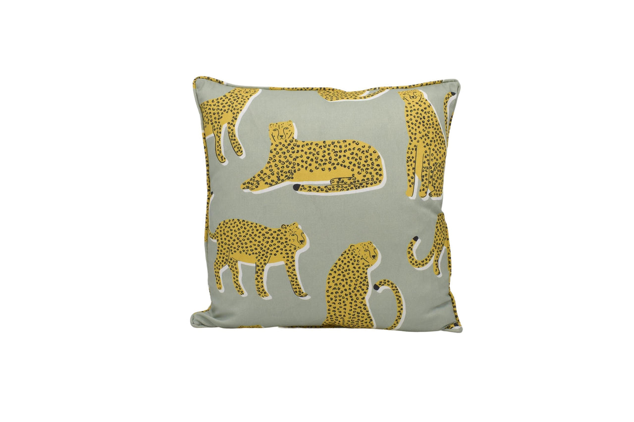 a yellow and grey pillow with leopards on it