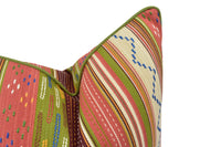 Thumbnail for a close up of a colorful pillow on a white background