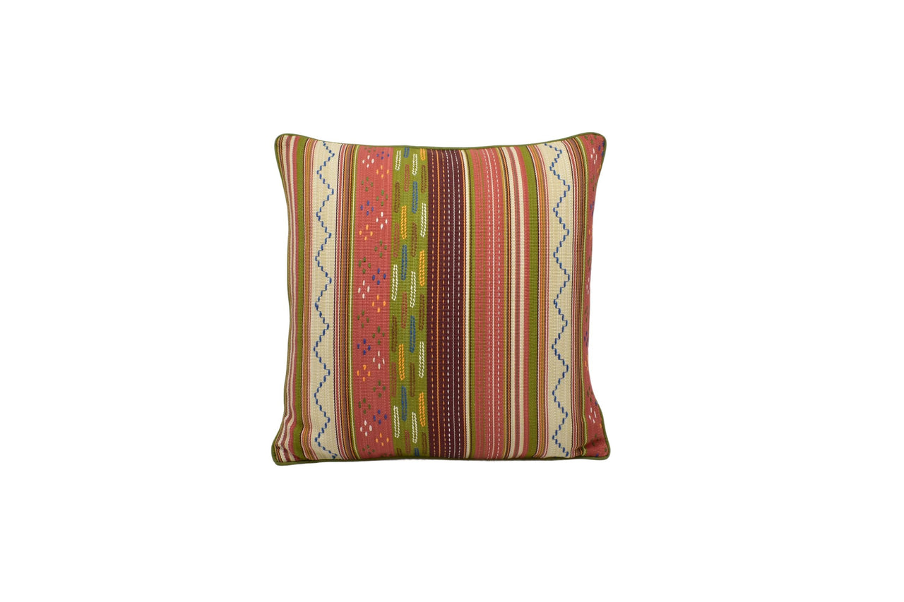 a colorful striped pillow on a white background