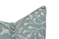 Thumbnail for a close up of a blue and white pillow on a white background