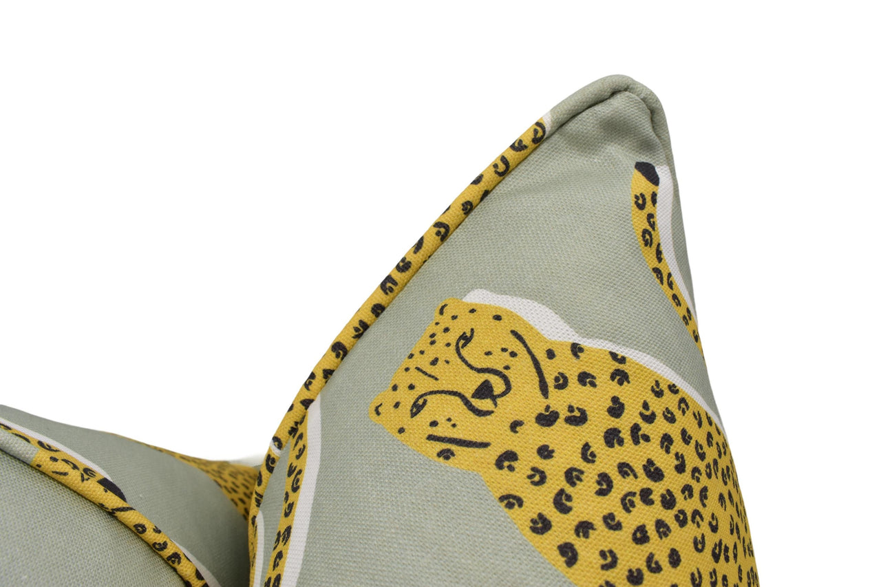 a pillow with a yellow leopard on it