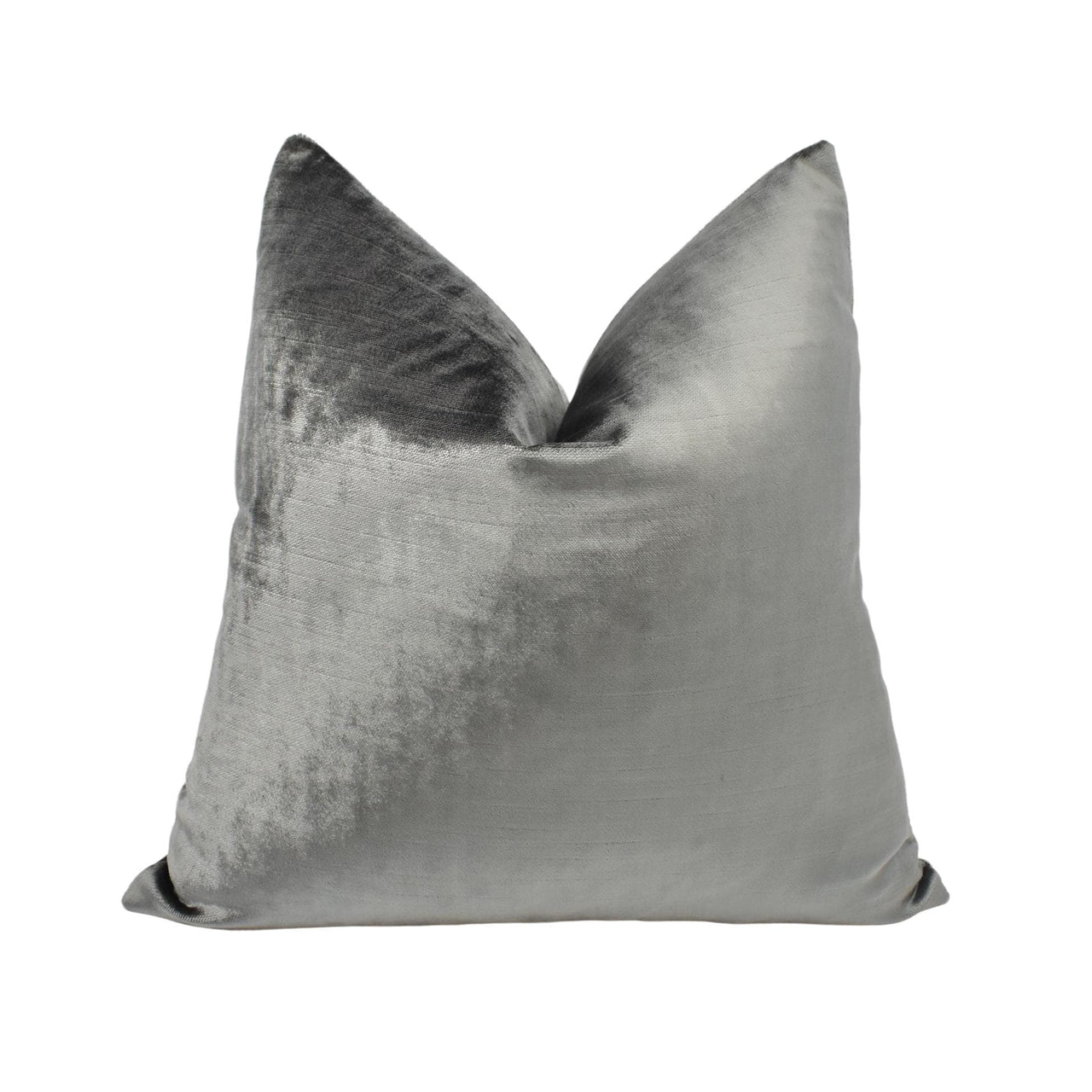 a silver pillow on a white background