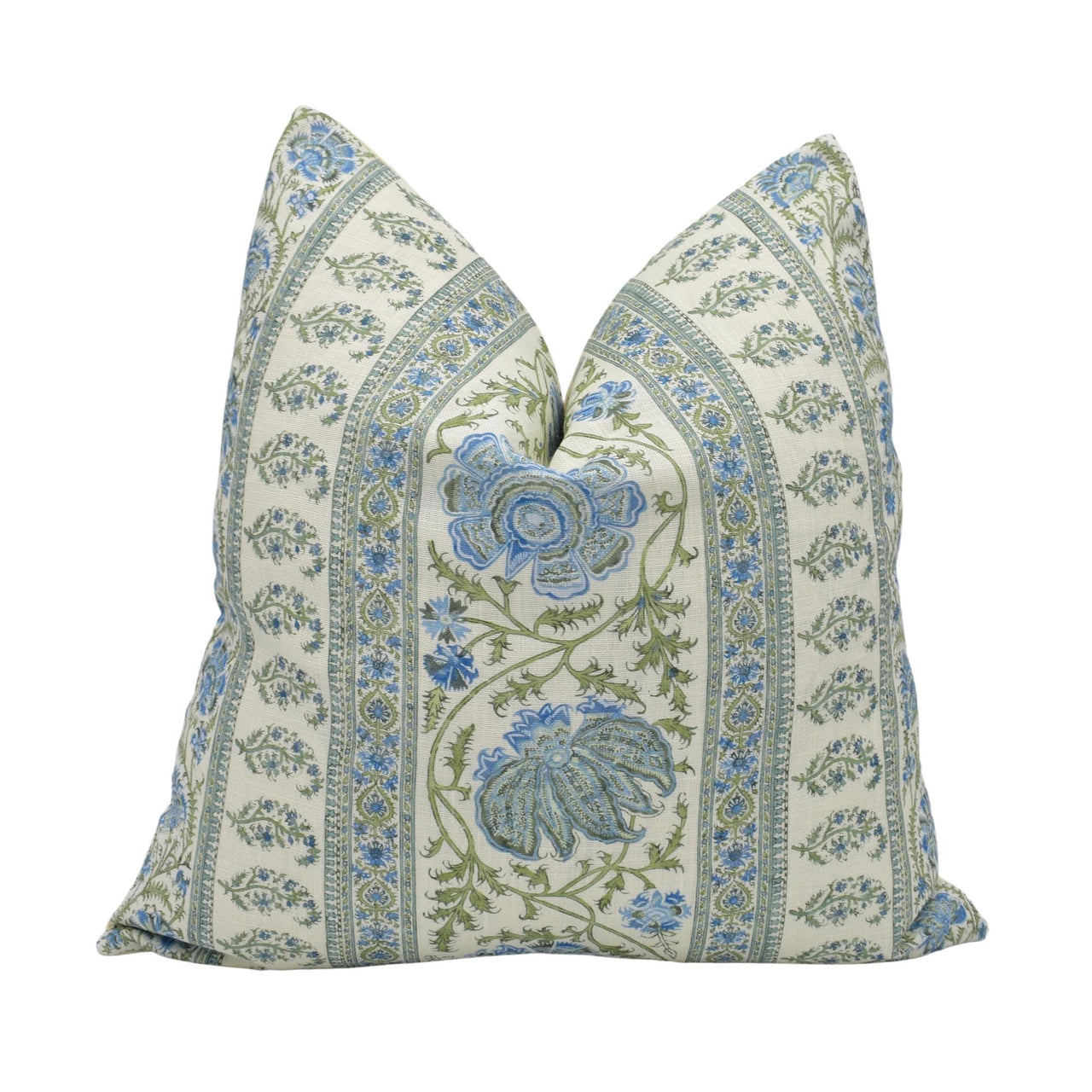 a blue and white pillow with a floral design