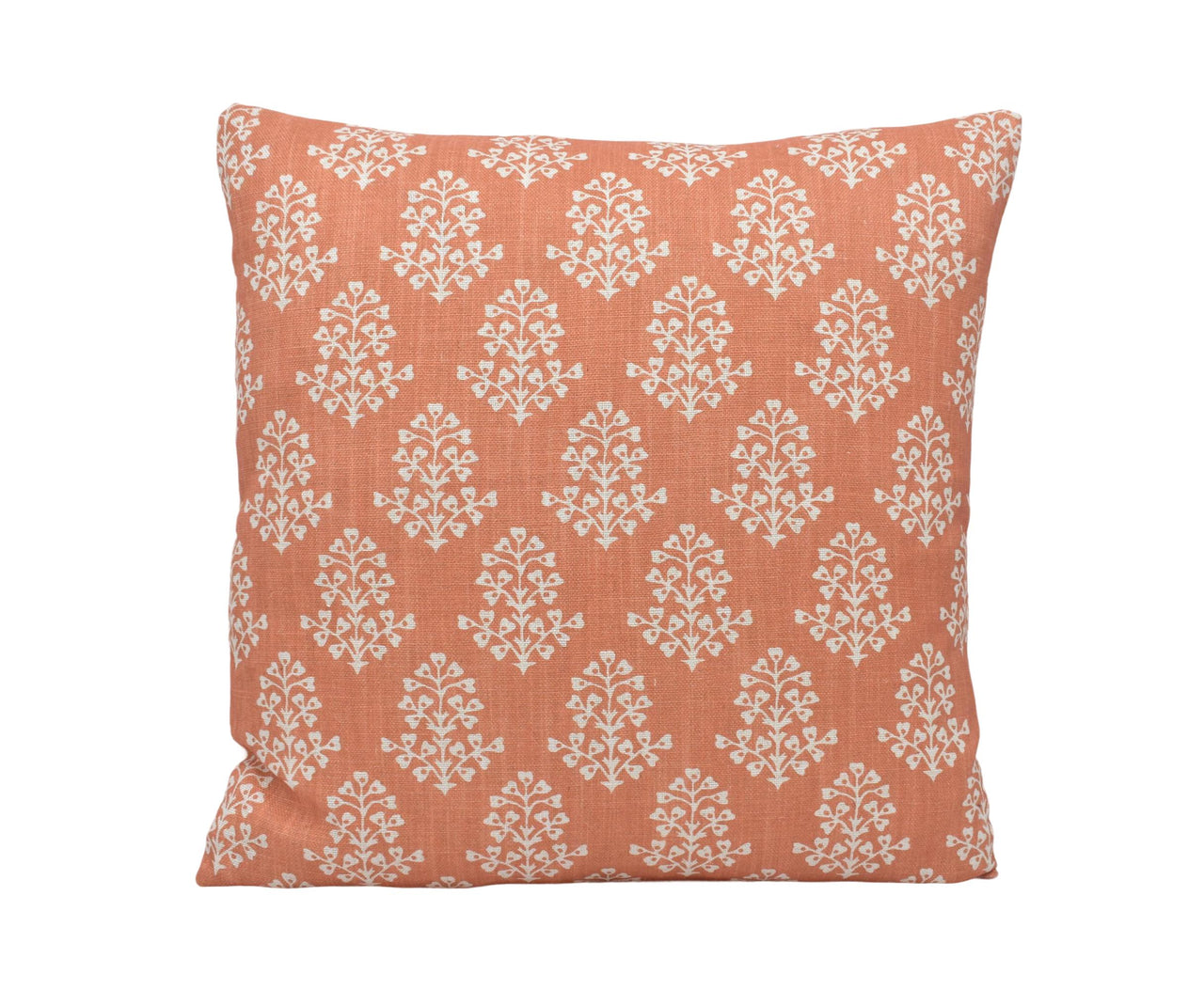 an orange and white pillow on a white background