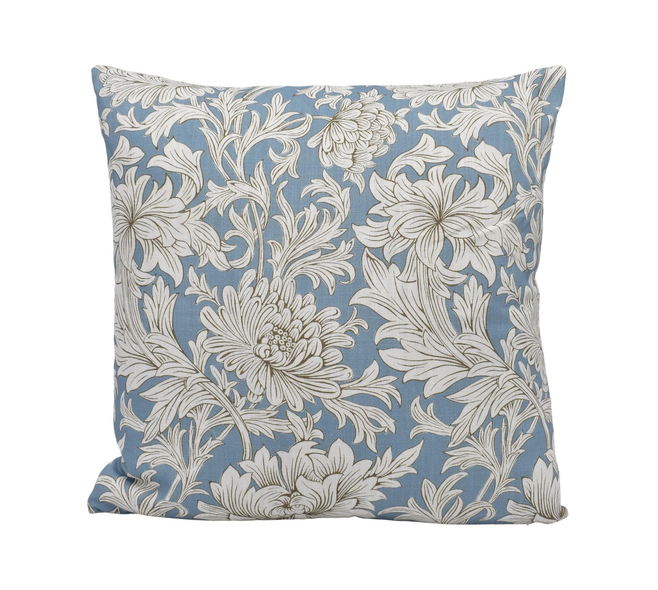 a blue and white pillow with white flowers on it