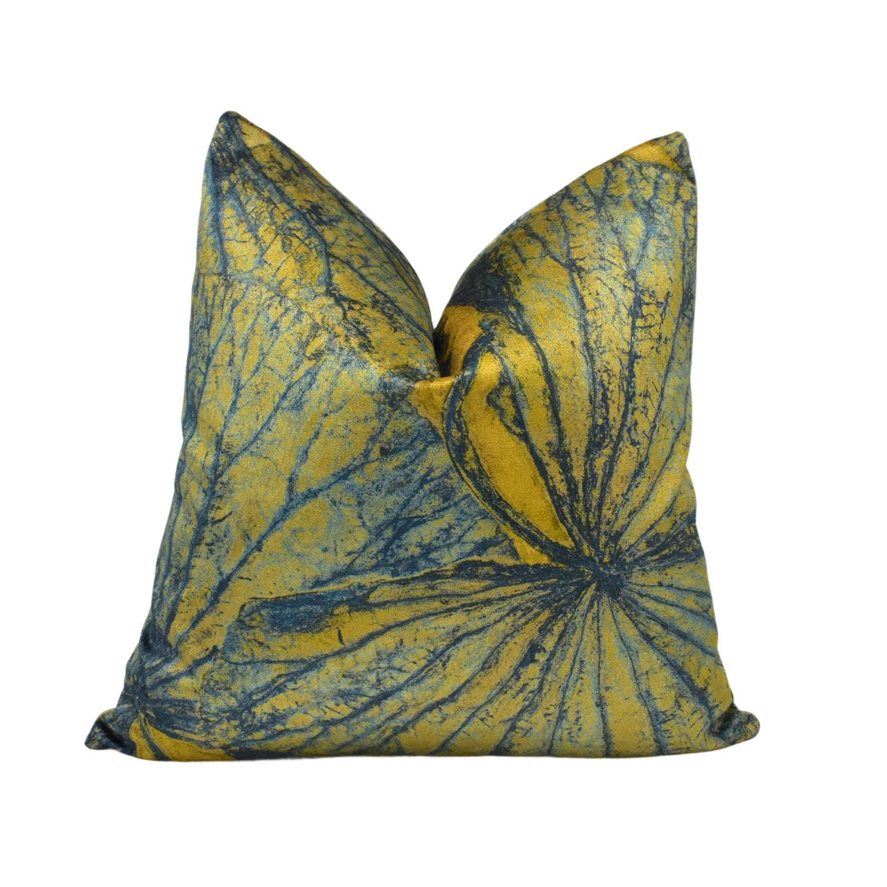 a yellow and blue pillow with a leaf design on it