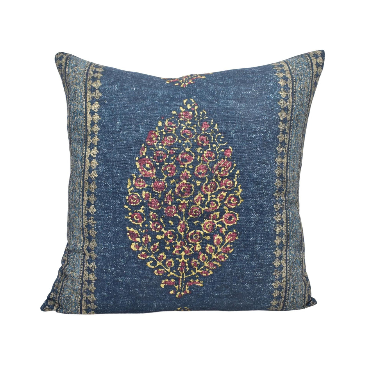 a blue pillow with a floral design on it