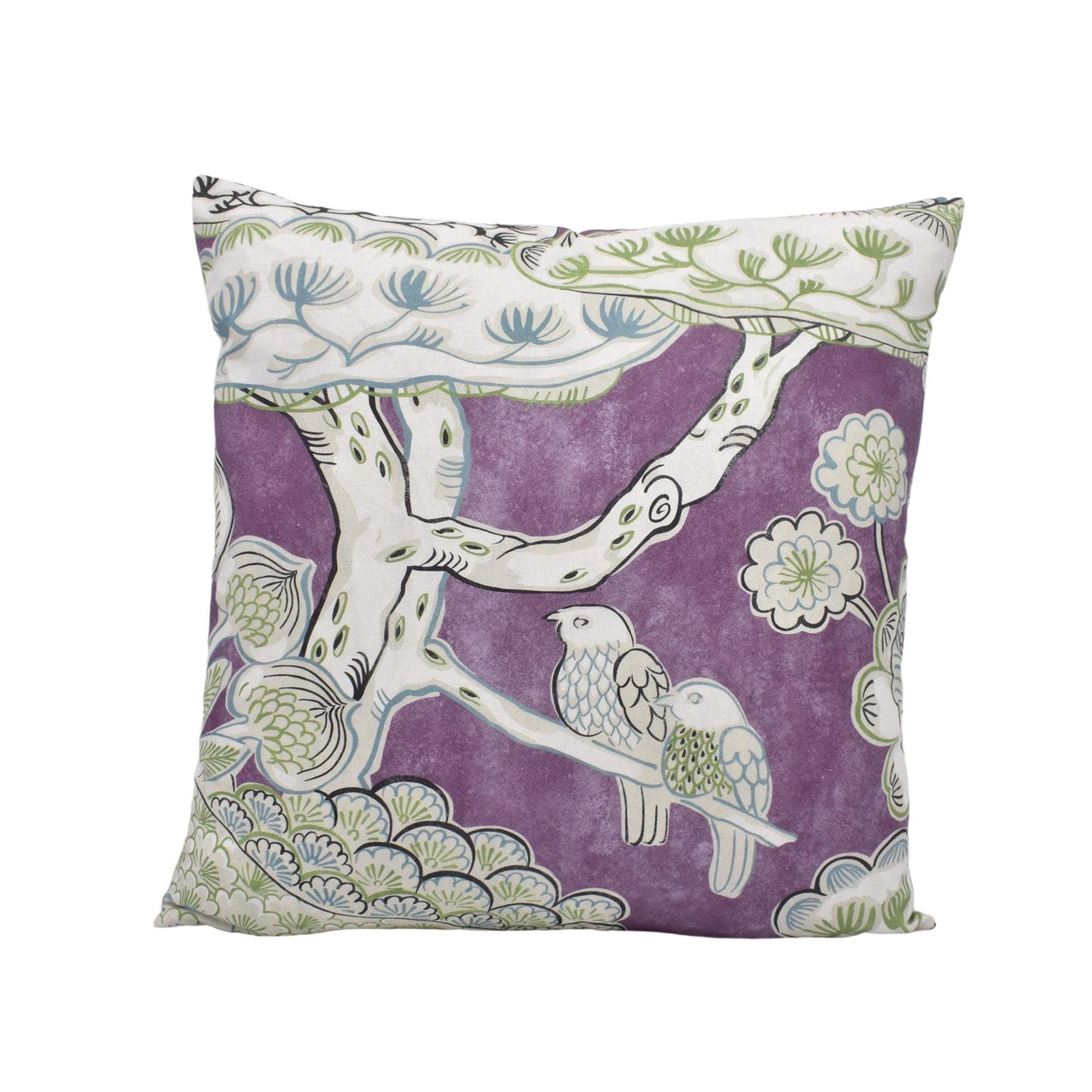 a decorative pillow with birds and flowers on a purple background